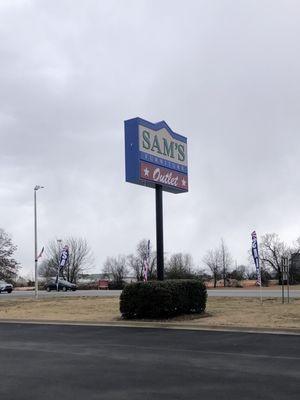 View of HWY 412 & Sam's sign from their parking lot.