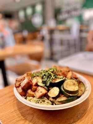 Pesto noodle with miso tofu, zucchini, teriyaki chicken topped with cilantro