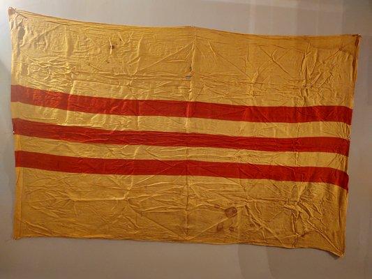 Embassy flag from Tet offensive of 1968. With bullet holes and blood stains