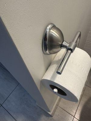 Broken toilet paper fixture