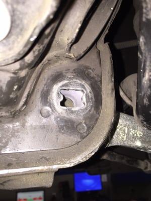 This hole is for Camber bolts to align your suspension.