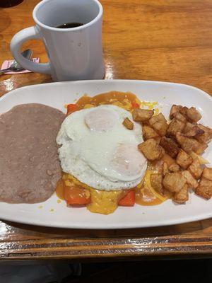 Cheese enchiladas with eggs over easy