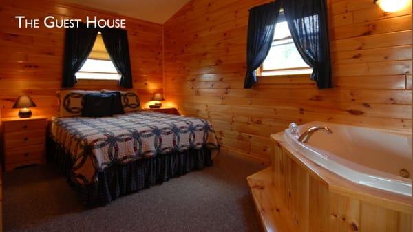 The Guest House with fireplace and Jacuzzi at the Cabins at Lopstick, Pittsburg NH