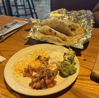 Flour tortillas for the fajitas and the fixins on the side.