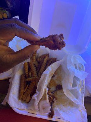 Wings are bite size & fries were burnt