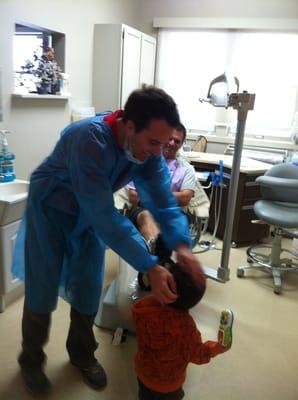 Caleb is trying to distract the dentist