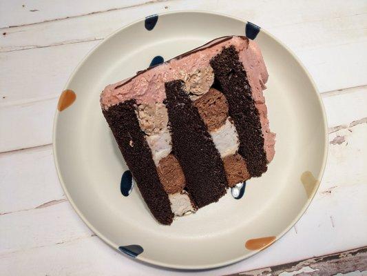 Why yes, a piece of chocolate cake, please, with pink buttercream frosting.