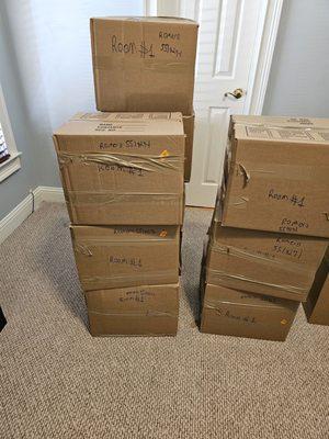 Packed boxes prior to loading/cross-country move. Note the shoddy packing job.