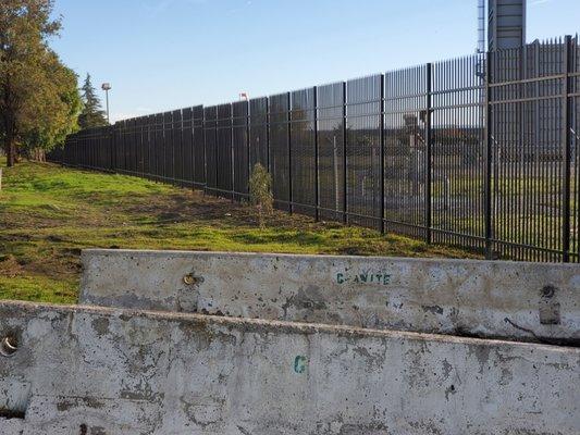 12' tall custom built and powder coated steel Fencing