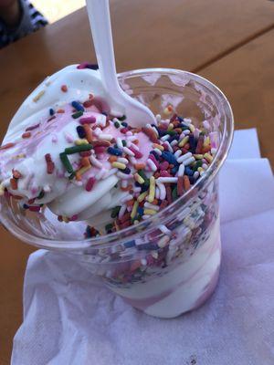 Vanilla and strawberry soft serve with rainbow sprinkles