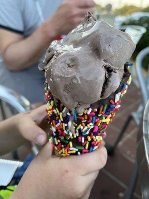 Chocolate in a sprinkle waffle cone