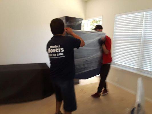 Martinez Movers 
LOADING TRUCK!