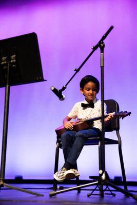 Rocking the stage at Prado Music Academy's recital! Huge shoutout to our amazing guitar student who played with such skill and style.