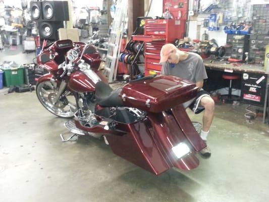 Shaun putting the final touches on my 2012 custom Road Glide.  He does a great job.  Got me in and out of there real quick.