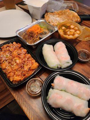 Spicy chicken, shrimp spring rolls and seafood soup.