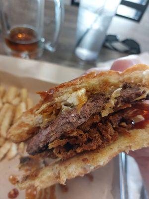 Burger was overcooked but blue cheese crumbles and amaaazing onion strings and BBQ sauce made up for it