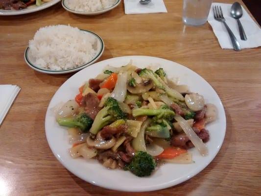 Broccoli with beef and steamed rice.