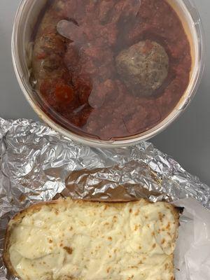 This is the small bucket with meat sauce, a meat ball and an Italian sausage link, with a 1/4 loaf with cheese added.