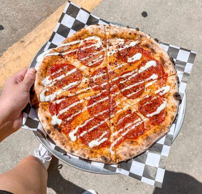 classic pepperoni + fresh parmesan, red pepper flakes, our home-made ranch and Smith's hot honey from Petal, MS