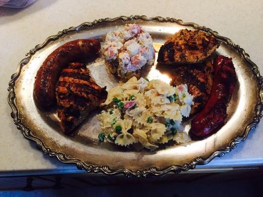 Garlic-cheese and Chinese red sausage and cilantro lime turkey tips, and pre-made bacon pea pasta and bacon cheddar potato salad