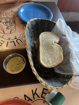 Fresh bread comes to the table with an olive tapenade