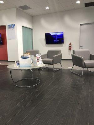 Comfy waiting area with plenty of space to social distance. Also a coffee and water station and vending machines for a snack.