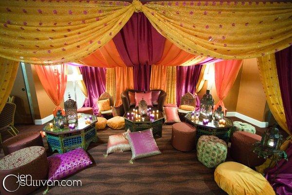 Fusion Henna Mehndi party with Moroccan design. Cabana with low furniture