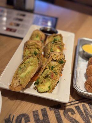 Avocado egg roll app. Very tasty & super light crispy flaky shells