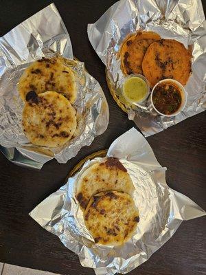 From top left: Revuelta, Birria, and Chicharron pupusas