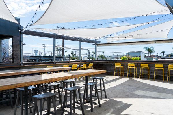 Rooftop patio with a view of the ocean