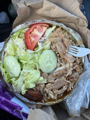 Roast pork, salad, and rice & beans (they're in there ;-). Enough for two.