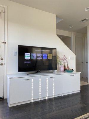 Base Cabinets in Latitude North Texture Flat Finish Entertainment, Chrome Hardware. Client Picture.