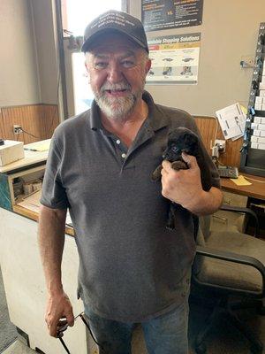 Tim with our shop puppy