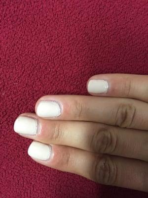 This is two coats and a top coat. The top coat doesn't even cover the whole nail and you can tell