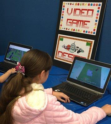 Learning to create her own video game!