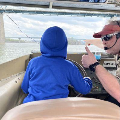 Capt Barry let our son take the wheel!