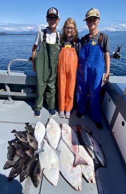 Cruise ship guests with their halibut, rock fish and salmon