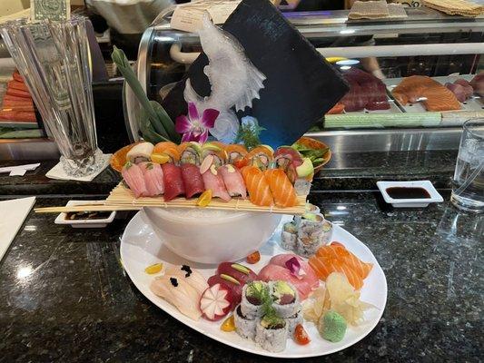 Sushi for 2 with a complimentary rainbow roll, subbed in a Florida and Alaska roll.