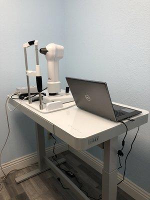 Corneal topography to measure the shape of the cornea for custom contact lens fits.