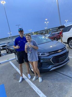 Ryan and my daughter with the car he helped us with.