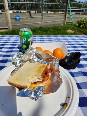 Breakfast sandwich with egg ($6). Cuties ($1 for 3 ct). Soda ($1). Very reasonable and helps make an affordable show day!