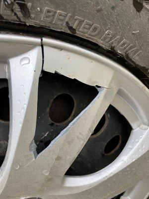 Cracked hubcap after
 reinstalled at Town 
 Fair Tire