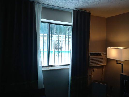 a view of the elevated pool from room 101 (across from the ice machine)