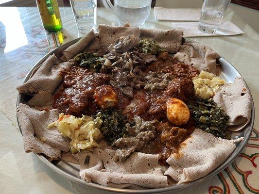 Sampler platter with meat and an order of Tibs beef