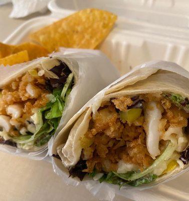 The Bristolian- Fried calamari, hot pepper rings, shredded mozzarella cheese, mixed greens, roasted garlic mayonnaise in a flour wrap.