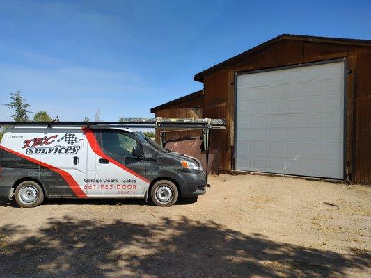 New custom barn garage with zero clearance track.