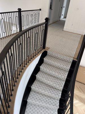 Pattern runner on steps, landing and hall designed and installed By Aladdin Carpet & Floors