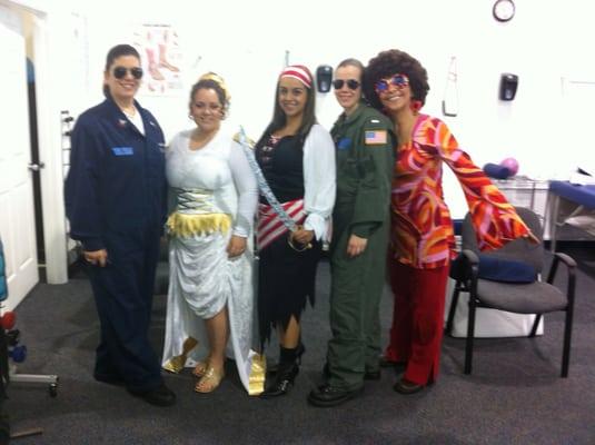 CORA Doral staff strutting their costumes Halloween 2011.