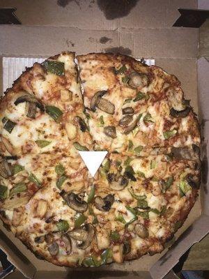 medium handmade pie with chicken, mushrooms, and green peppers