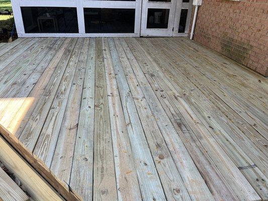 Repaired deck framing and deck boards.